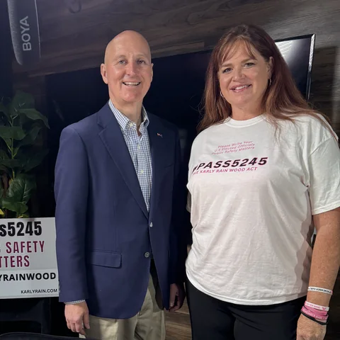 Senator Pete Ricketts with VINA founder Amber Wood.